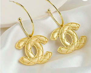 Gold tone C Earrings